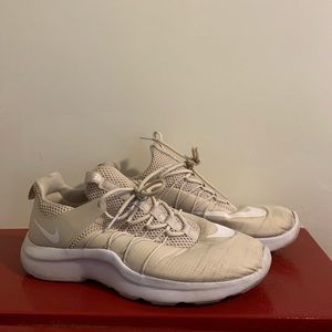 white nike running shoes